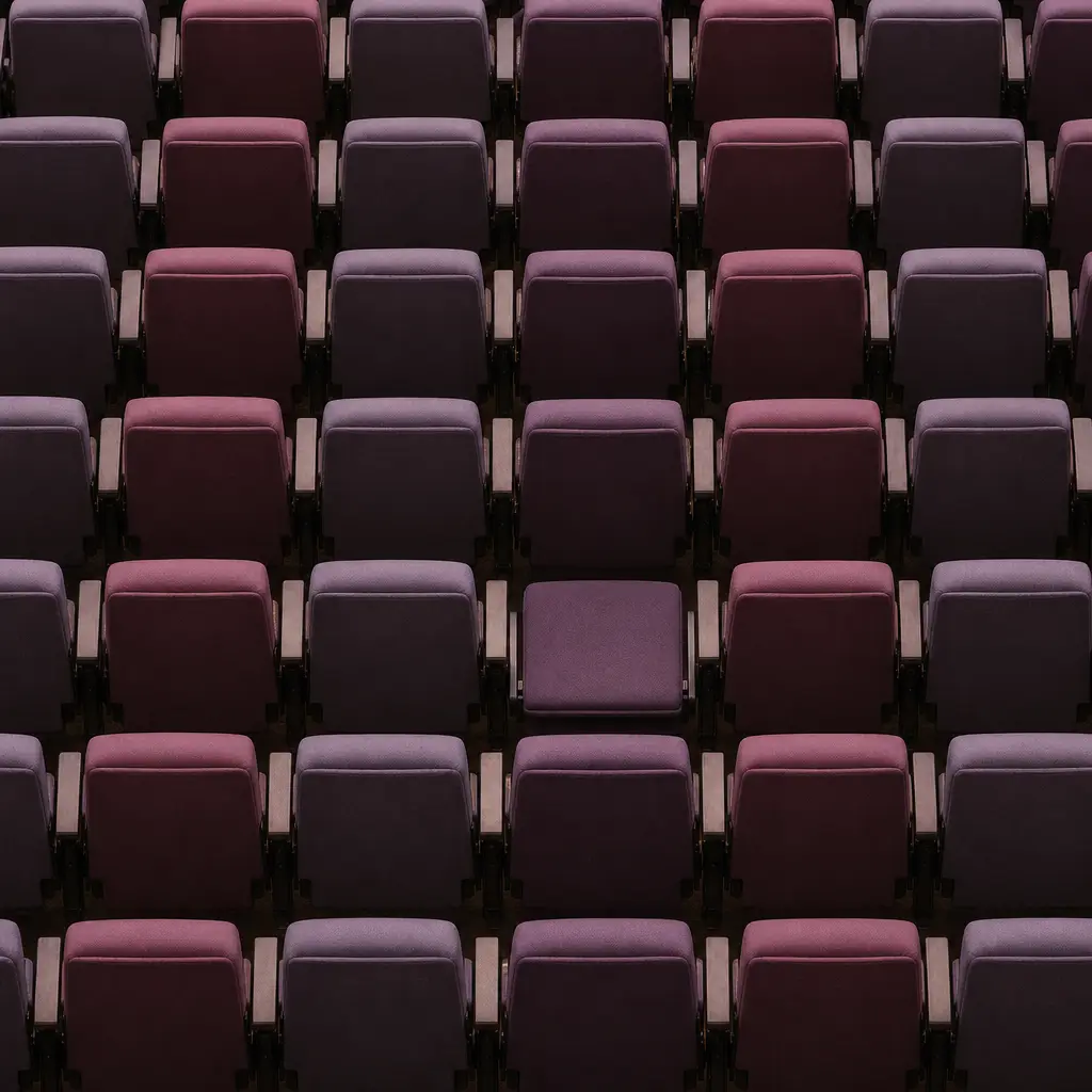 Rows of empty folding seats from directly above