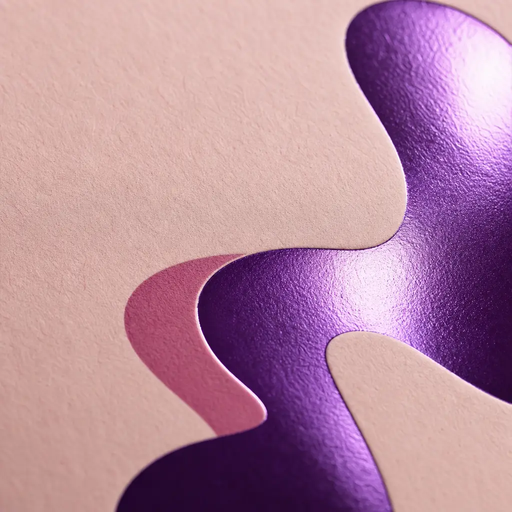Violet foil catching the light on card stock